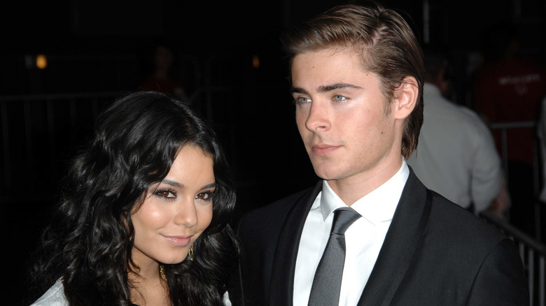 Vanessa Hudgens, Zac Efron, looking distant