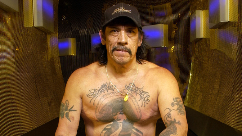 Danny Trejo shirtless and tattooed