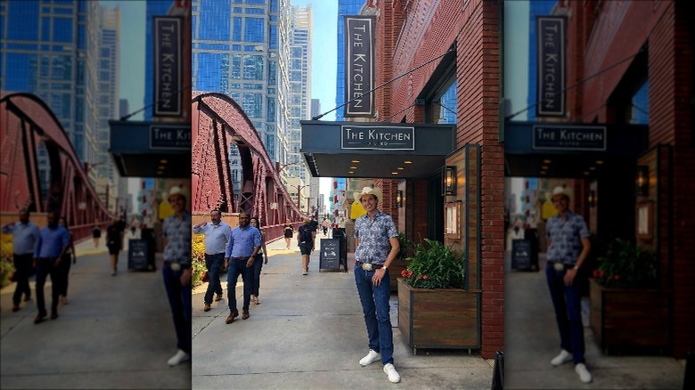Kimbal Musk in front of his restaurant