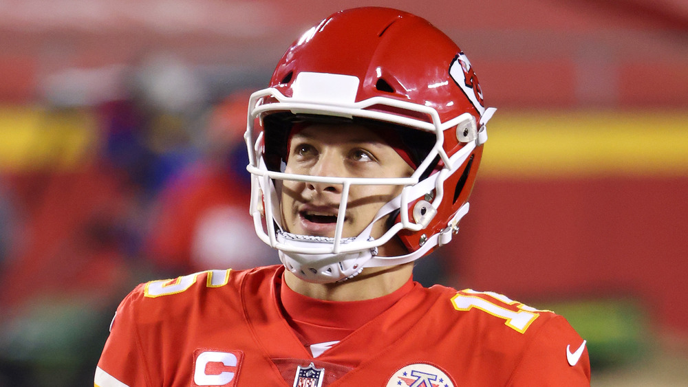 Patrick Mahomes wearing his uniform on the football field