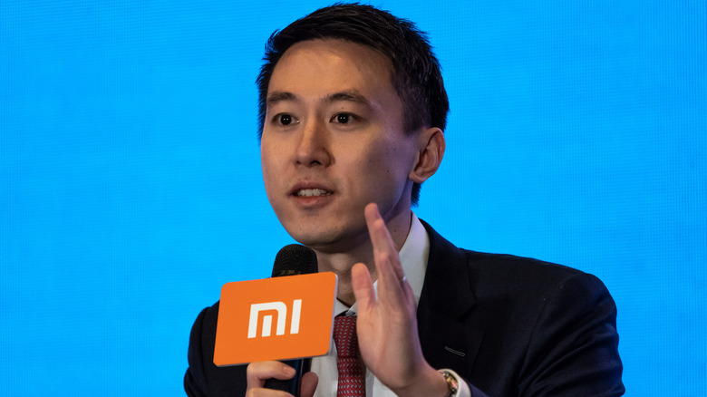 Shou Zi Chew speaking at conference
