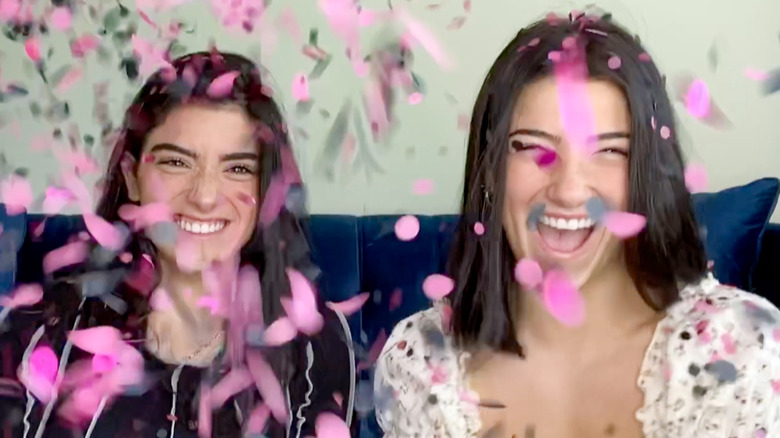 Charli D'Amelio Dixie D'Amelio laughing with confetti