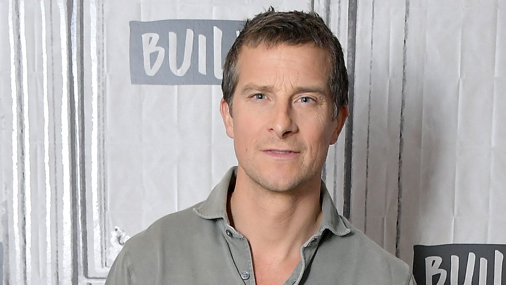 Bear Grylls speaking to camera in a grey shirt