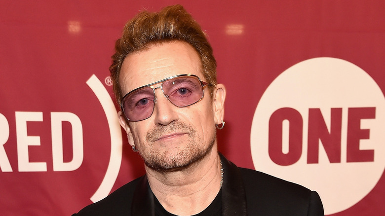 Bono weaering a black suit jacket