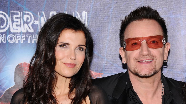 Bono with his arm around wife Ali Hewson