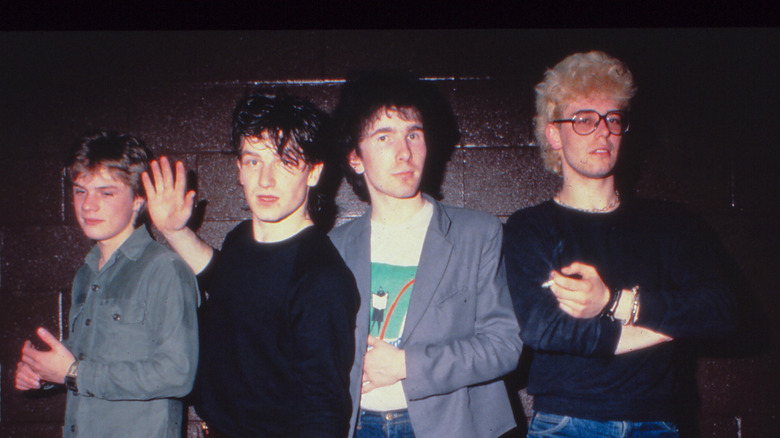 Young U2 posing