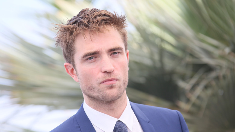 Robert Pattinson with a serious expression