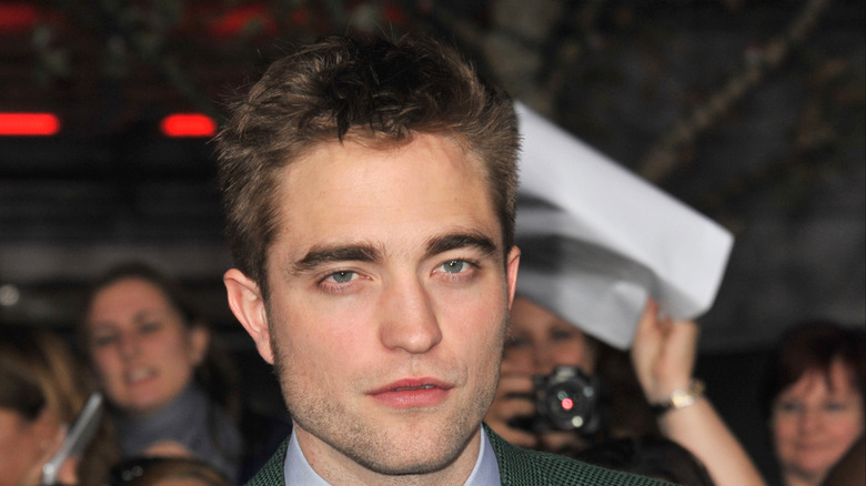Robert Pattinson with a serious expression