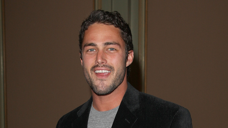 Taylor Kinney smiling