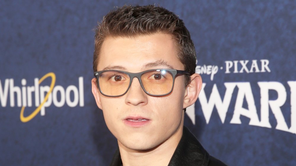 Tom Holland at the Onward premiere, with a surprised expression