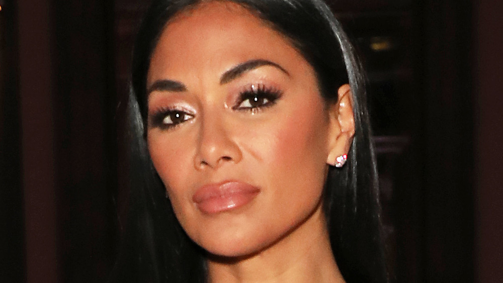 Nicole Scherzinger posing at an event