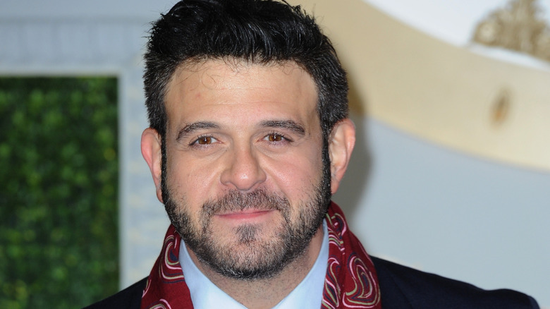 Adam Richman posing in London