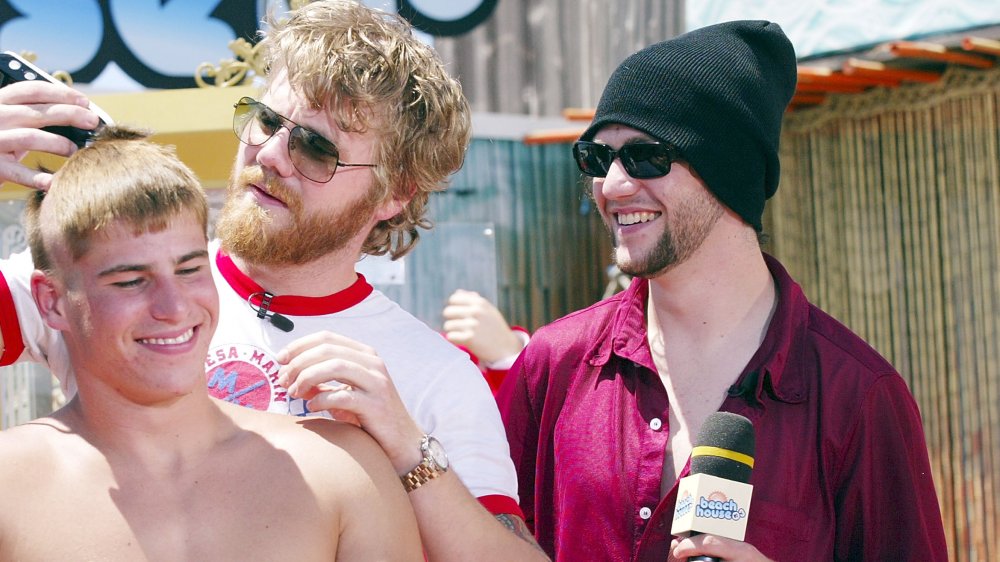 Ryan Dunn and Bam Margera shaving TRL audience member's head