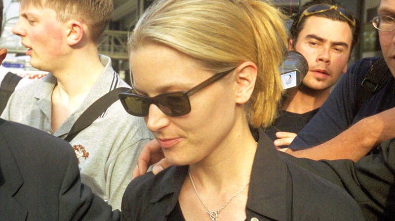 Bridget Fonda wearing sunglasses