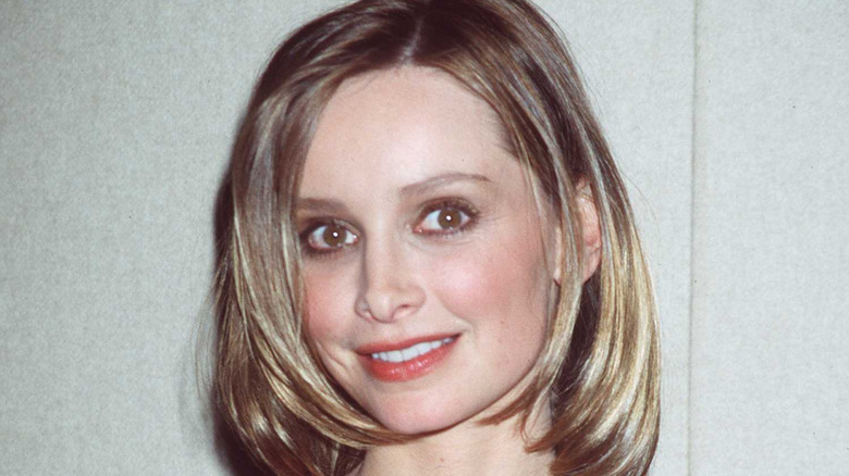 Calista Flockhart smiles on the carpet