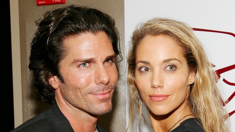 Elizabeth Berkley poses with Greg Lauren