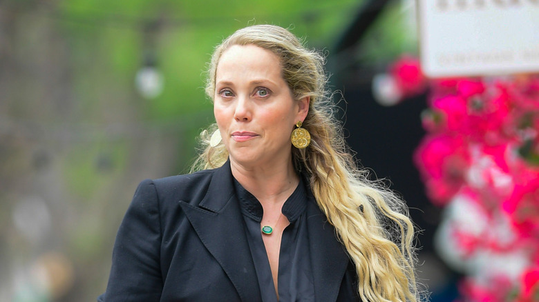 Elizabeth Berkley wearing black