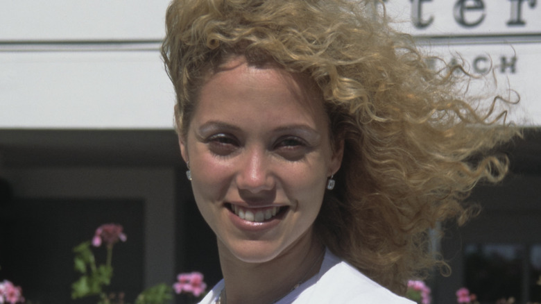 Elizabeth Berkley posing
