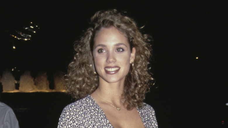 Elizabeth Berkley posing