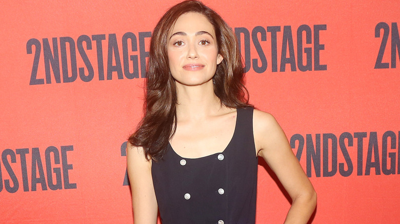 Emmy Rossum posing on the red carpet at the Second Stage Theater