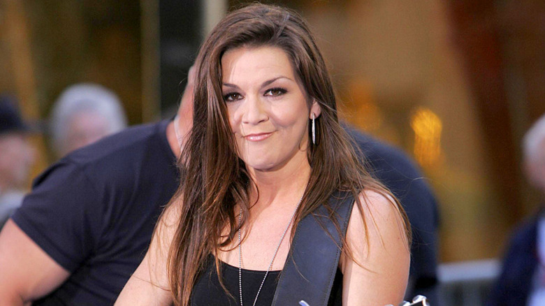 Gretchen Wilson performing on stage fronting her band