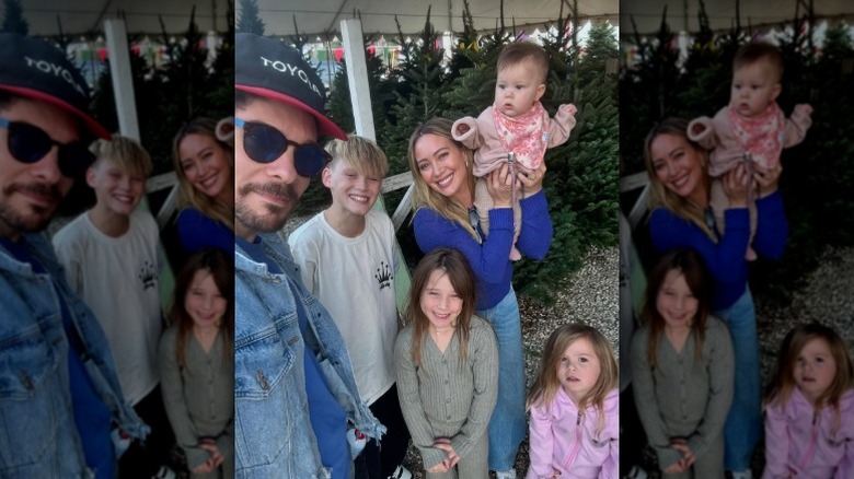 Hilary Duff poses with husband and four children