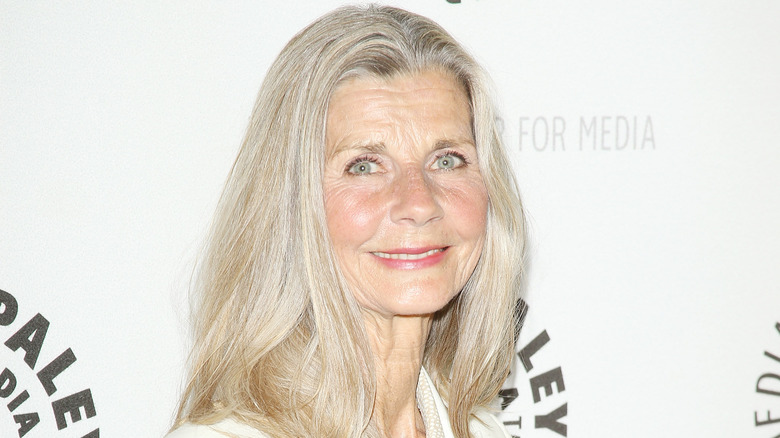 Jan Smithers poses in white outfit