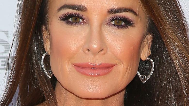 Kyle Richards poses at an event