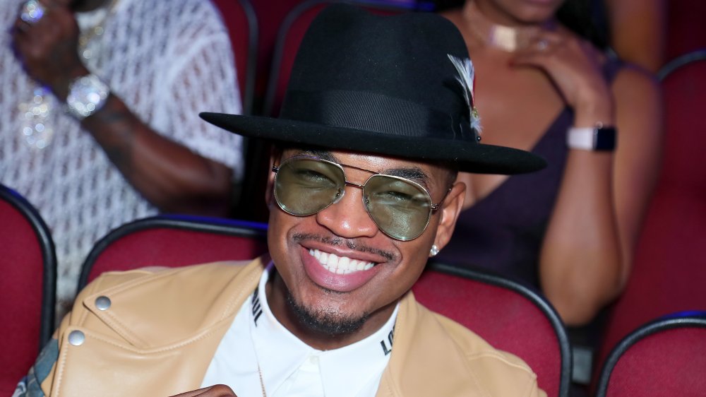 Ne-Yo with fedora and aviators