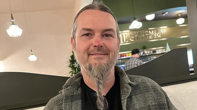 Ryan Evans smiling at a restaurant