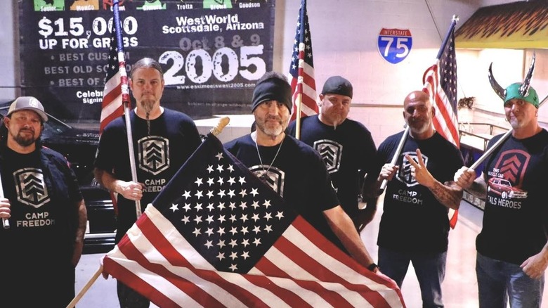 Counting Cars cast holding American flags