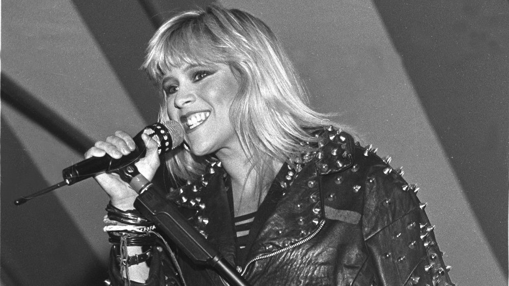 Black-and-white photo of Samantha Fox singing in 1989