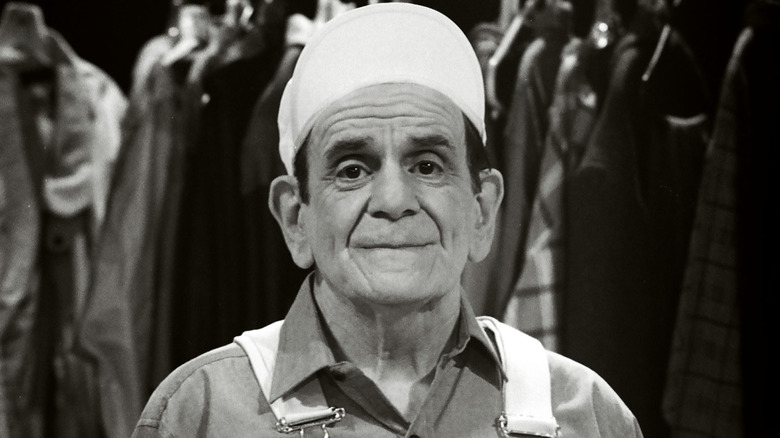 Sid Melton posing for a black and white photo on the set of 'Green Acres'