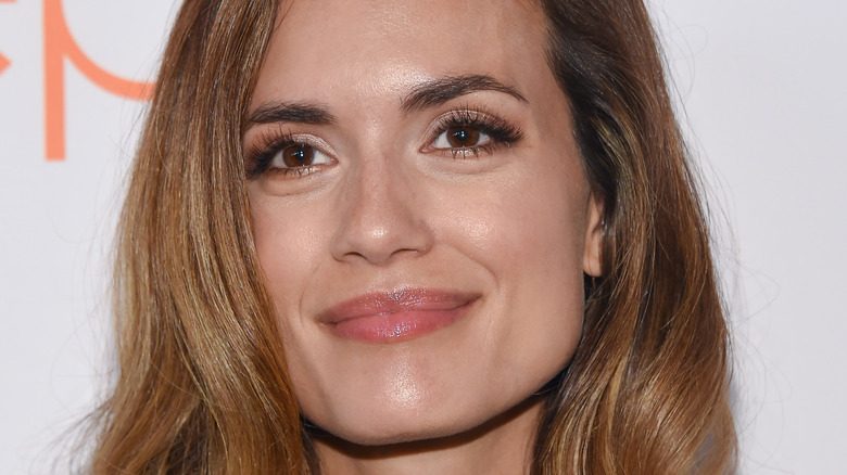 Torrey DeVitto smiling