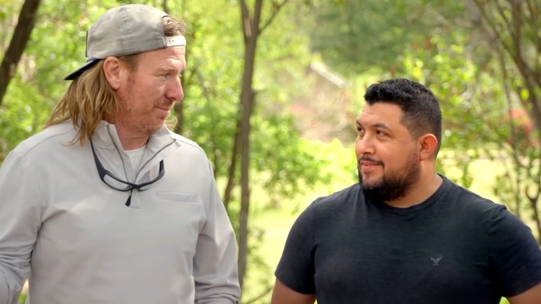 Chip Gaines and Saul "Shorty" Sanchez filming "Fixer Upper: Welcome Home"