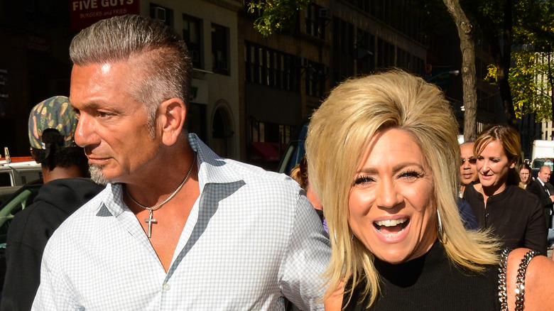 Theresa Caputo walks next to Larry