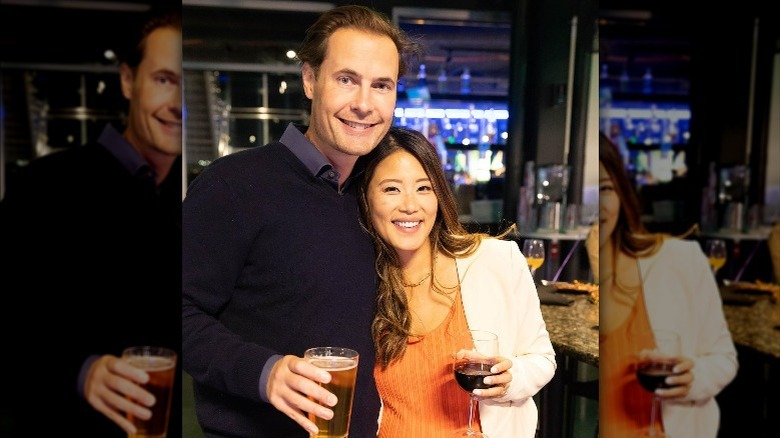 Erik and Angela von Detten holding drinks
