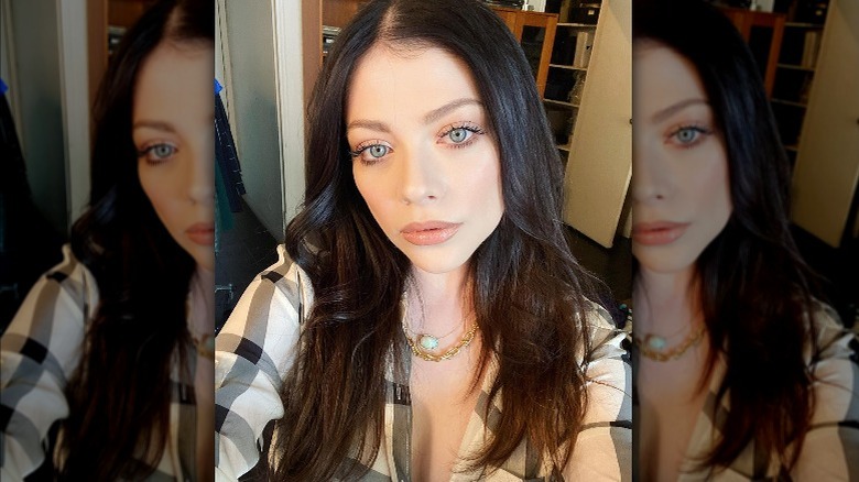 Michelle Trachtenberg wearing plaid top