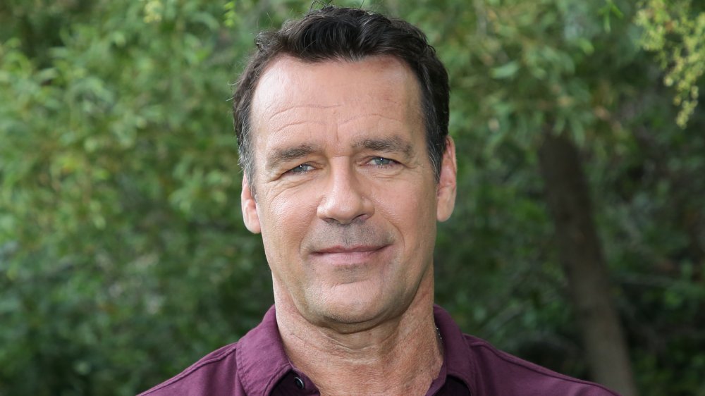 David James Elliott in purple button up