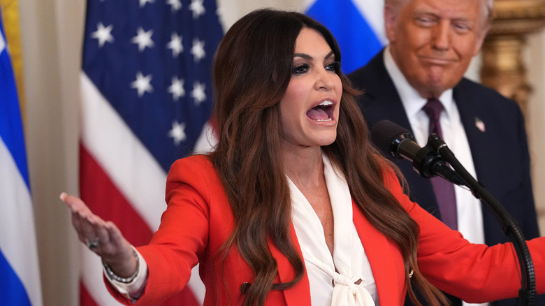 Kimberly Guilfoyle speaking at the White House as Donald Trump looks on