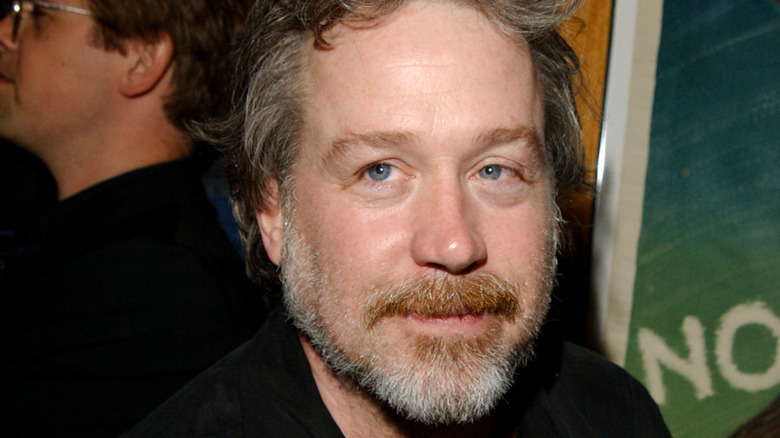 Tom Hulce smiling