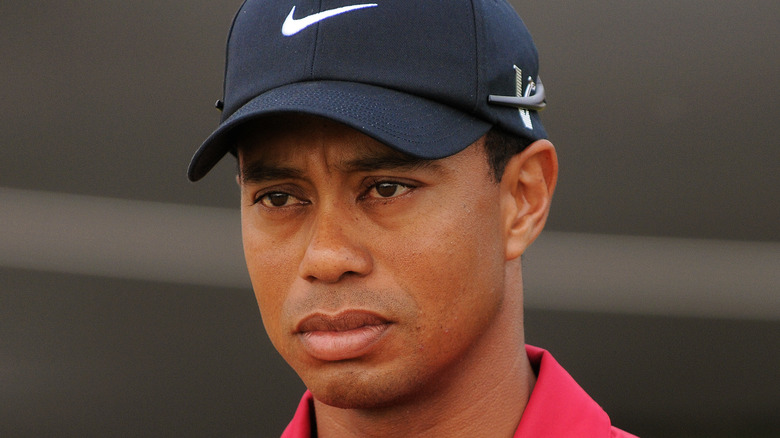 Tiger Woods wearing Nike hat