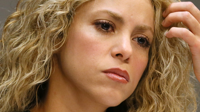 Shakira with a serious expression