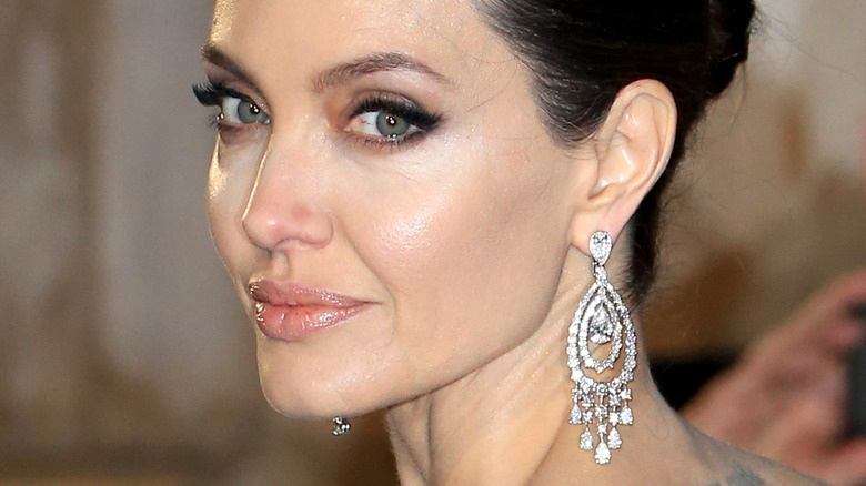 Angelina Jolie turning to the side at red carpet event