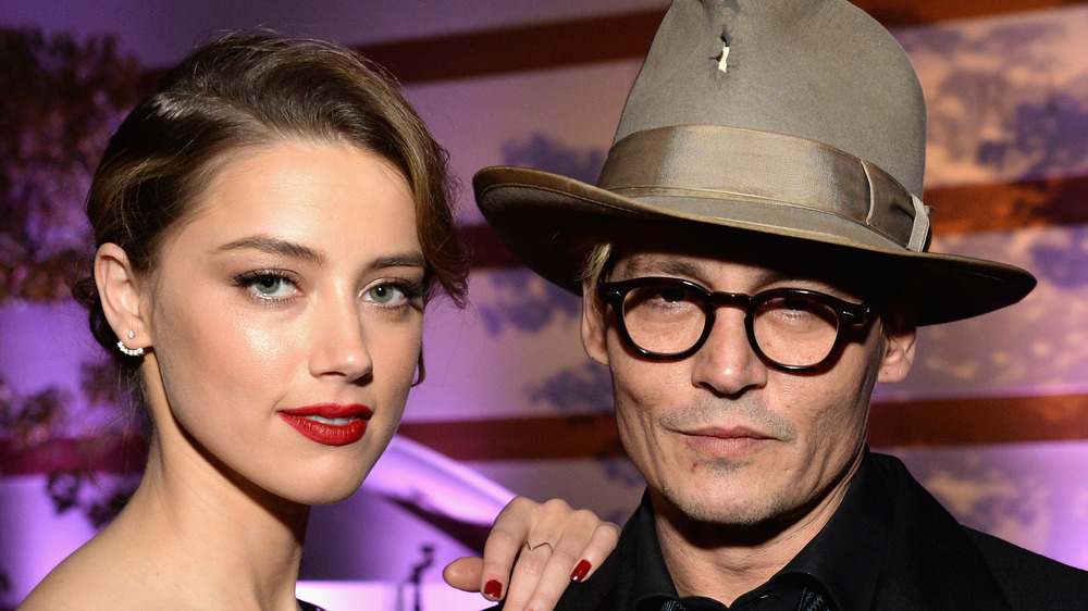 Amber Heard and Johnny Depp smiling together