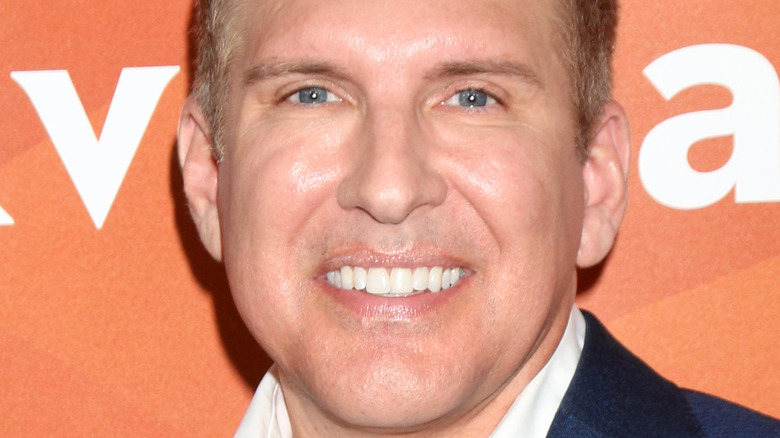 Todd Chrisley smiles