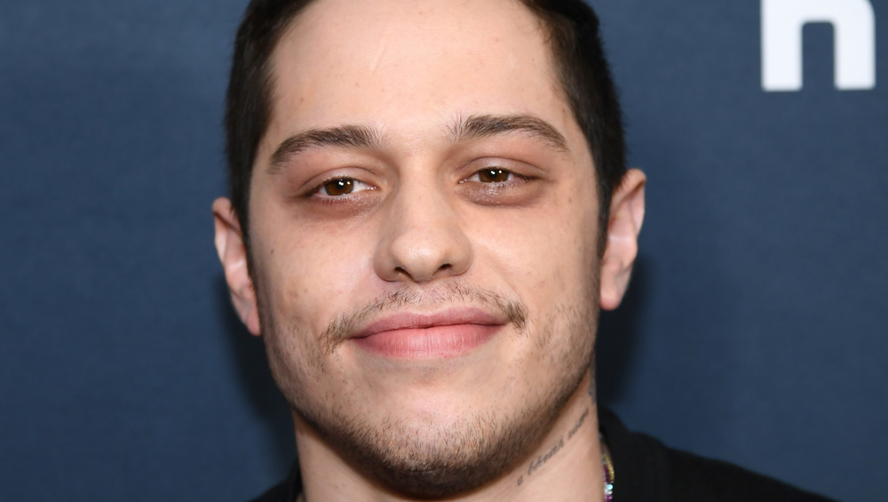 Pete Davidson posing at an event 