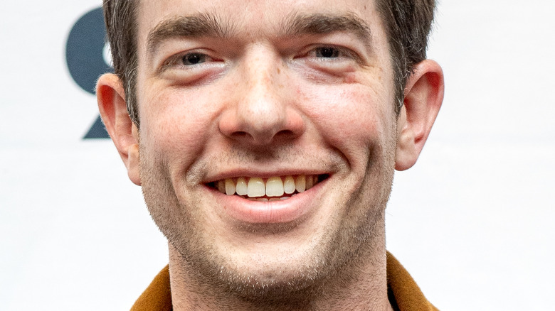 John Mulaney smiling