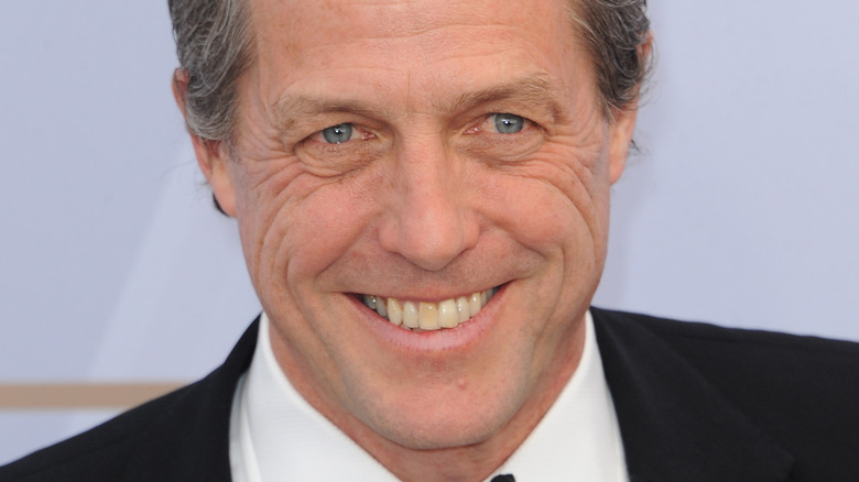 Hugh Grant smiling