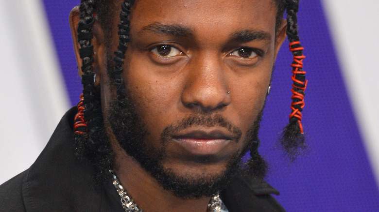 Kendrick Lamar beard dreadlocks red hairbands